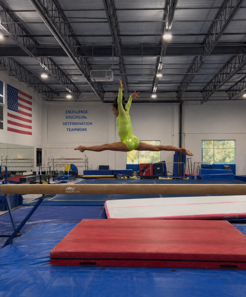 Female gymnast in a bright neon-green leotard mid-leap on a balance beam inside a gym.